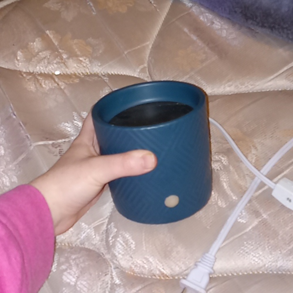 A Navy blue scentcy warmer